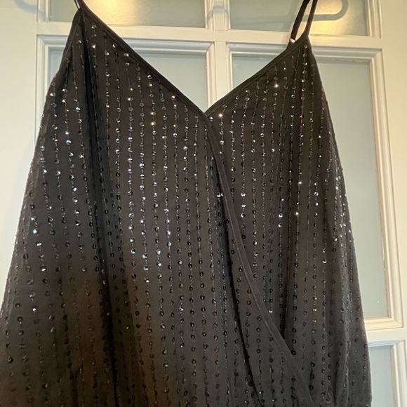 Elegant Black Sleeveless Jumpsuit - Picture 2 of 5